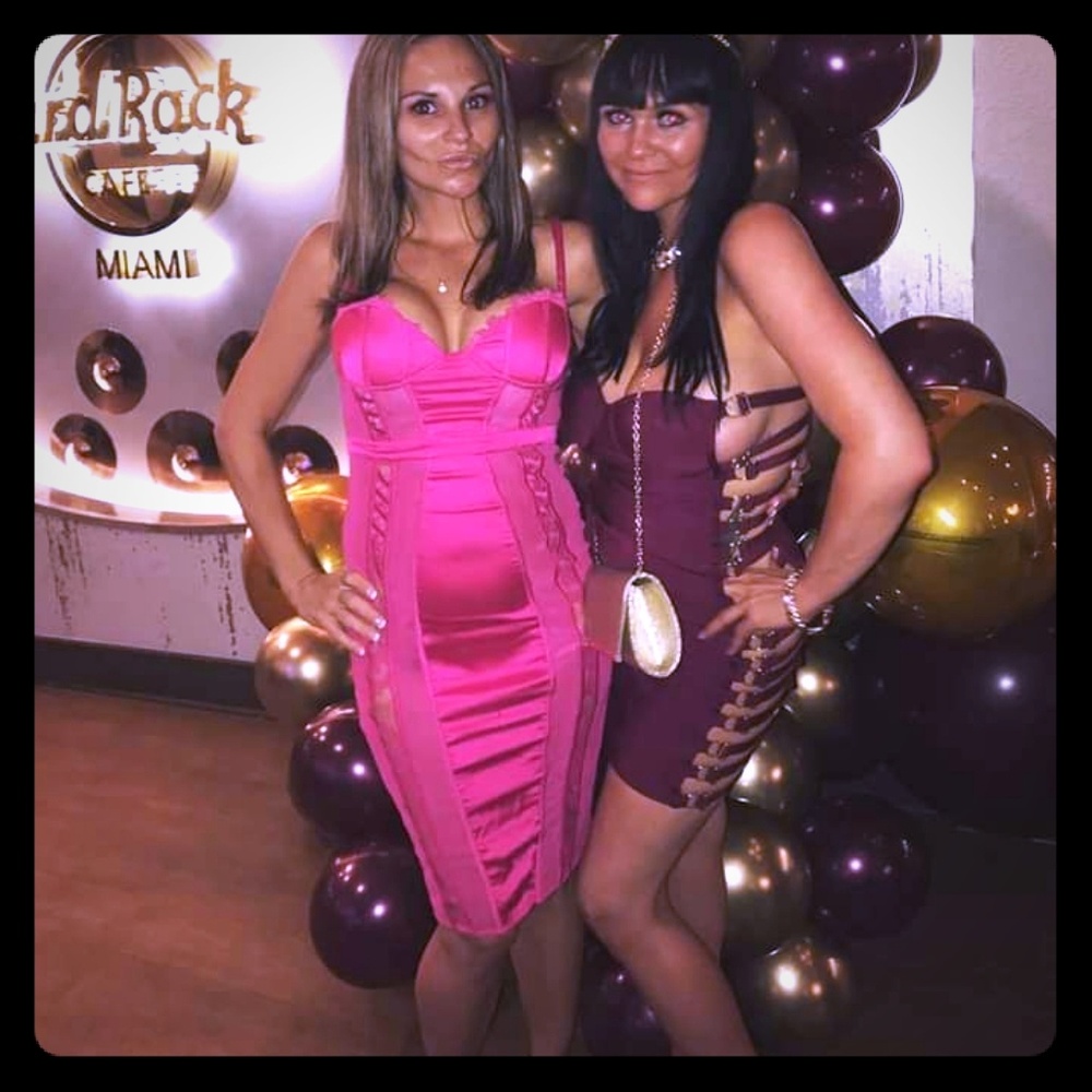 Hot pink bondage dress knee length.